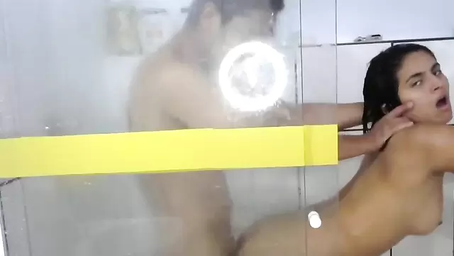 Slender Brazilian chick fucks a guy in the shower